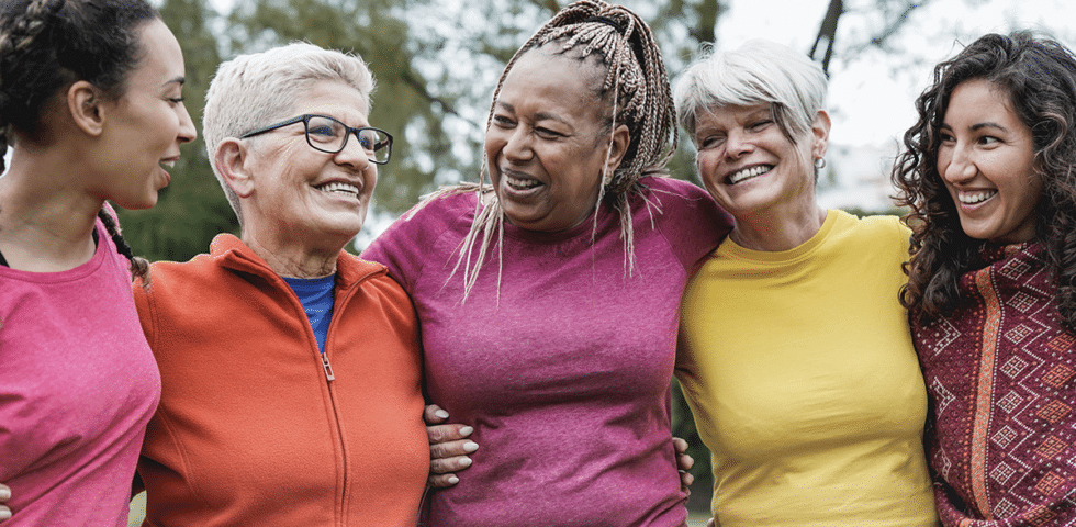 Five women smiling.